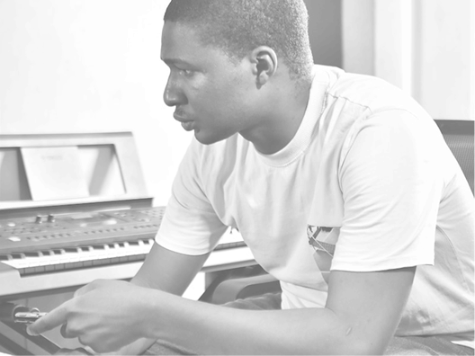 Teivah producer creating music in studio